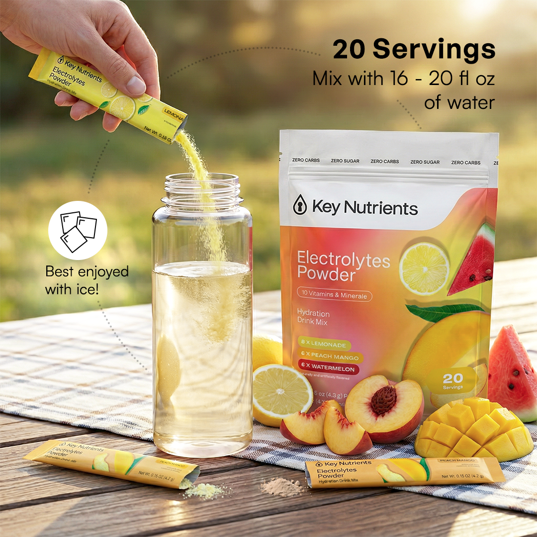 A hand pours Electrolytes Powder Variety Pack into a bottle; fruit and hydration essentials are nearby.