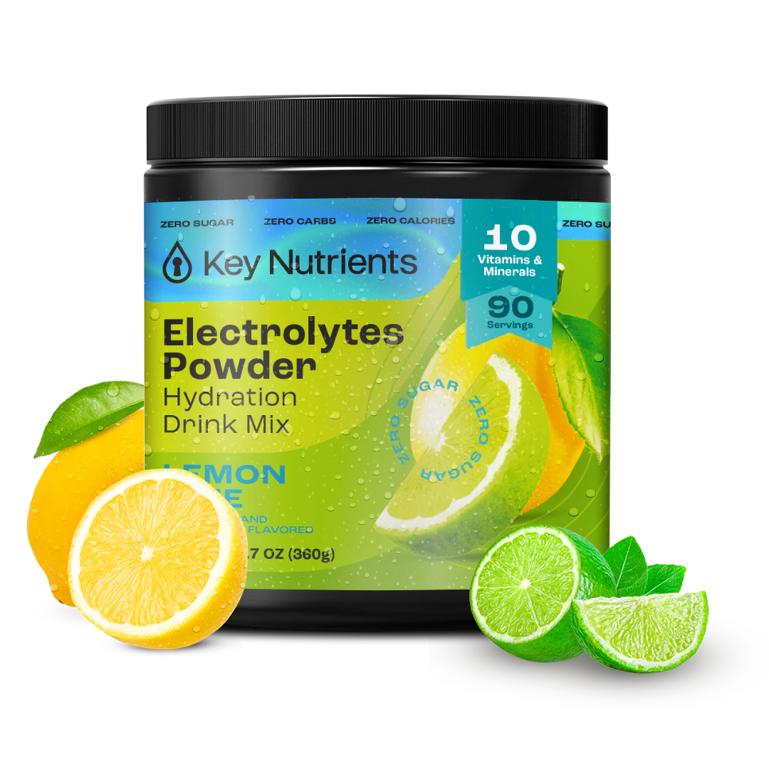 Container of Electrolyte Recovery Plus Powder (Sugar-Free) with fresh lemon and lime slices beside it.