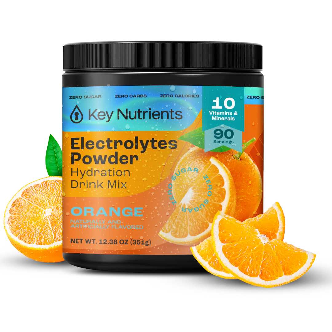 Jar of orange Electrolyte Recovery Plus Powder, a sugar-free drink, garnished with slices and leaves.