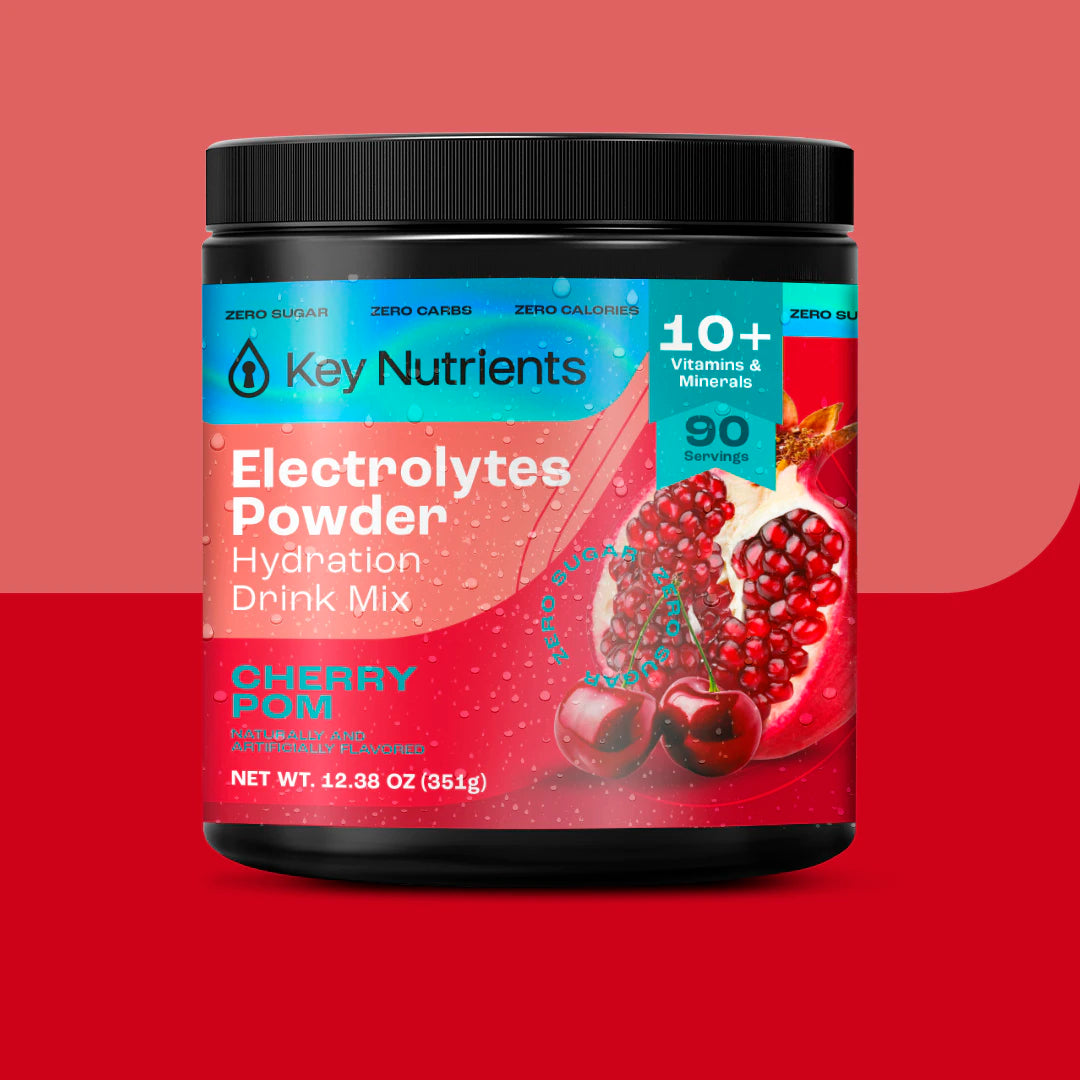 Cherry pom Zero-calorie Electrolyte Recovery Plus Powder, features cherries and pomegranate on red.