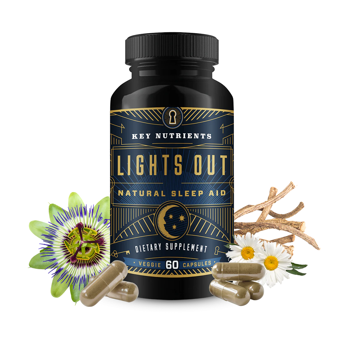 Bottle of Lights Out Sleep Aid, featuring herbal ingredients, melatonin, and GABA capsules placed around it.