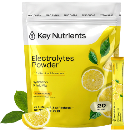 A pouch and stick pack of sugar-free Electrolyte Recovery Plus Powder Lemonade with lemon slices.