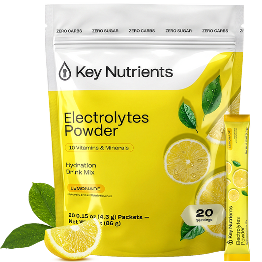 A pouch and stick pack of sugar-free Electrolyte Recovery Plus Powder Lemonade with lemon slices.