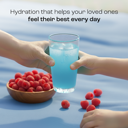 Adult hand passes Electrolyte Recovery Plus Powder (Sugar-Free) to a child beside raspberries on blue.