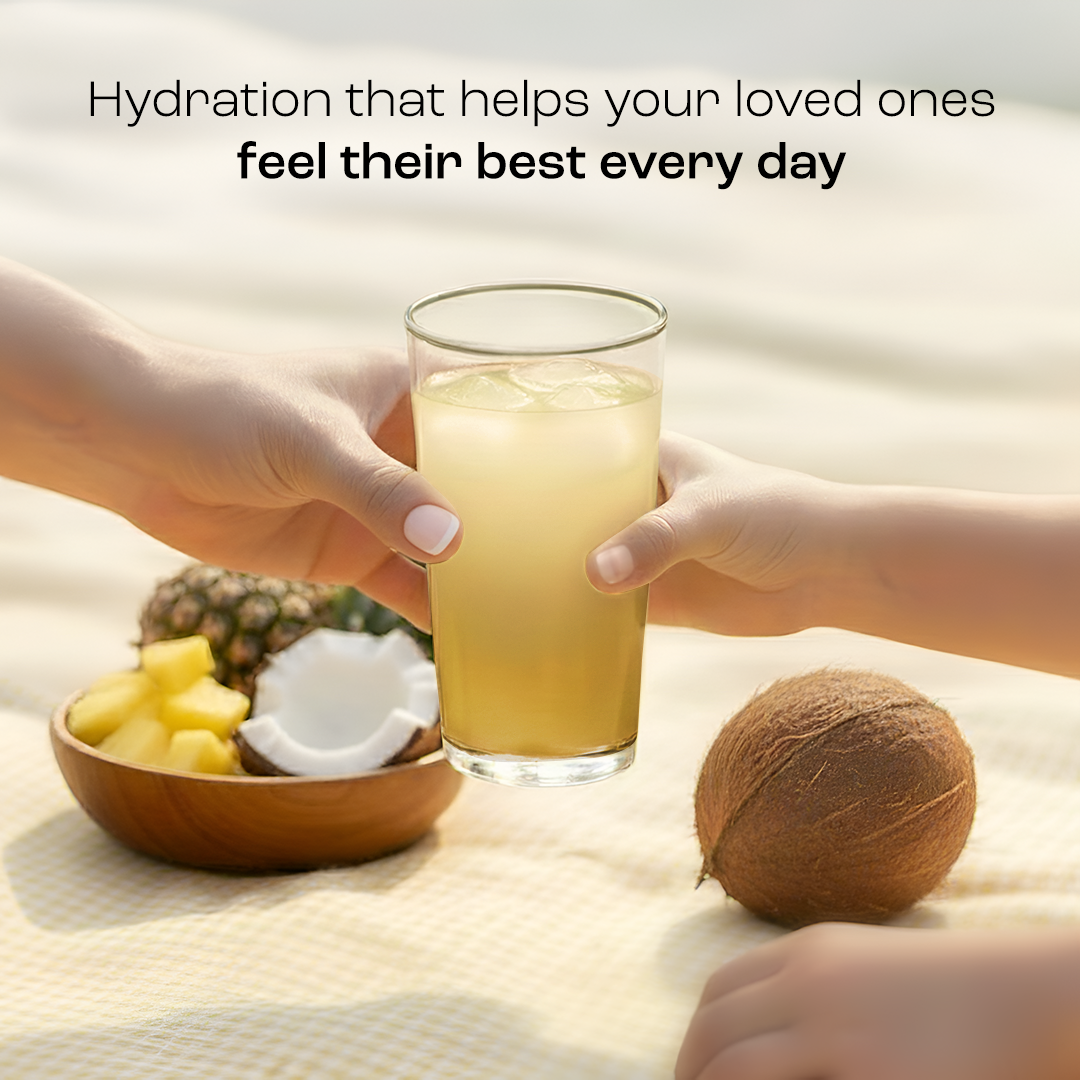 An adult and child hold Electrolyte Recovery Plus Powder (Sugar-Free) on a picnic blanket.