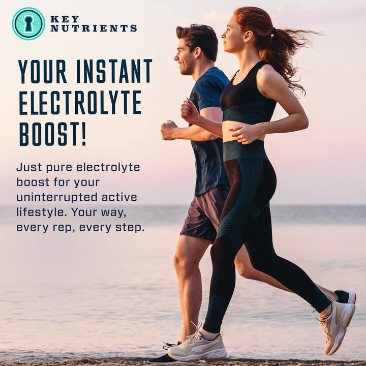Two people jogging on the beach, powered by Electrolyte Hydration Pills for optimal performance.