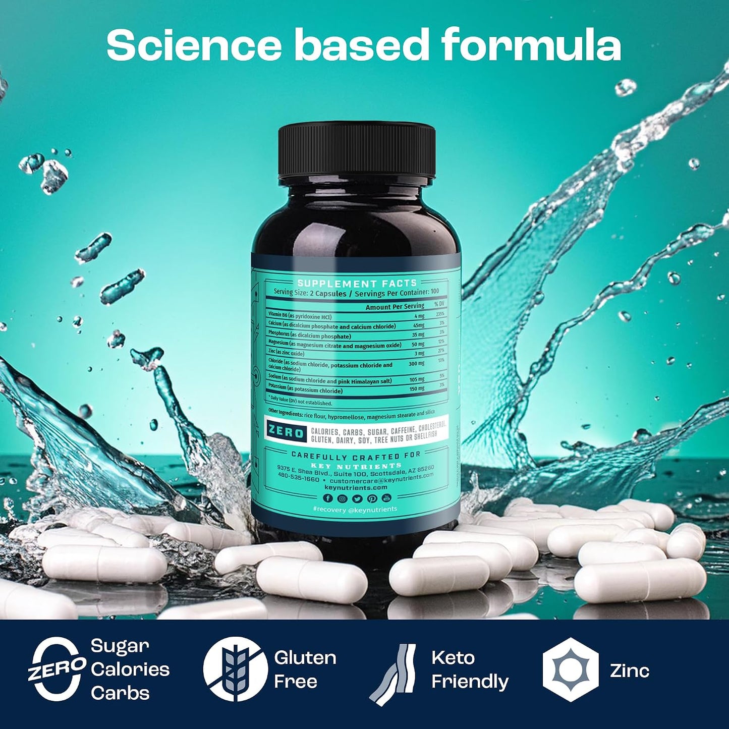 Black bottle with turquoise label, showing Electrolyte Hydration Pills capsules and water splash effect.