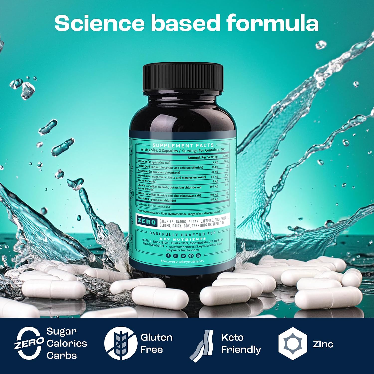 Black bottle with turquoise label, showing Electrolyte Hydration Pills capsules and water splash effect.