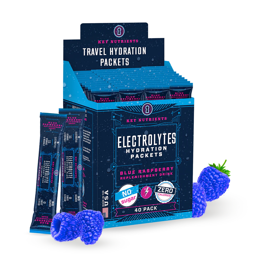 Package of Electrolyte Recovery Plus Powder (Sugar-Free), blue raspberry flavor, next to fresh blue raspberries.