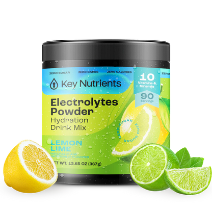 A container of Electrolyte Recovery Plus Powder (Sugar-Free), ideal for creating a keto-friendly hydration drink, sits beside fresh lemon and lime slices.