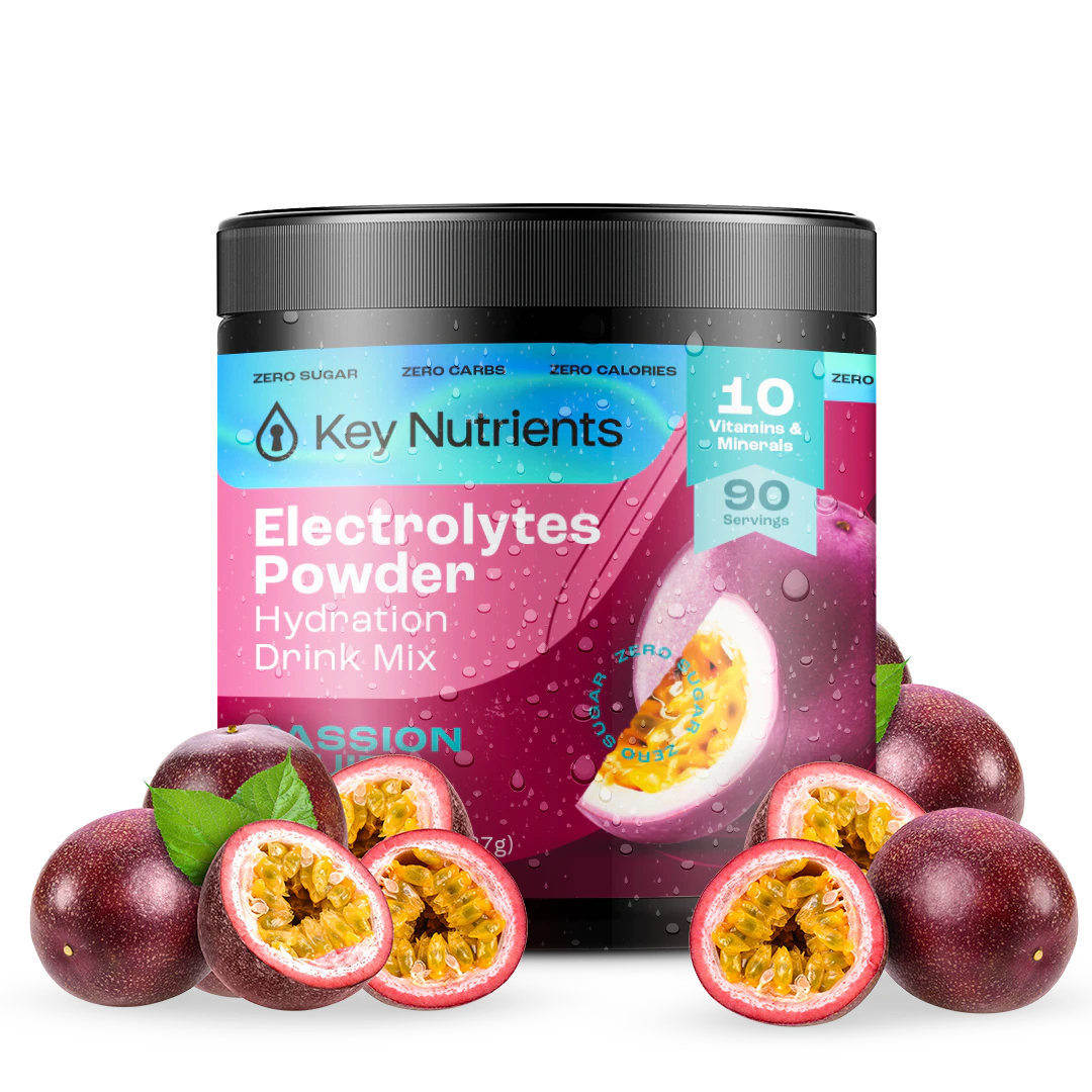 A vibrant jar of Electrolyte Recovery Plus Powder (Sugar-Free), ideal for a keto diet and infused with passion fruit flavor, sits amidst fresh passion fruits. This hydration drink not only tantalizes your taste buds but also replenishes essential nutrients for ultimate refreshment.