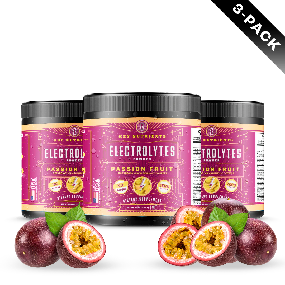 Three jars of Electrolyte Recovery Plus Powder (Sugar-Free) with passion fruit flavor are displayed invitingly, alongside fresh passion fruits. This hydration drink is both refreshing and keto-friendly, helping you stay energized and balanced.