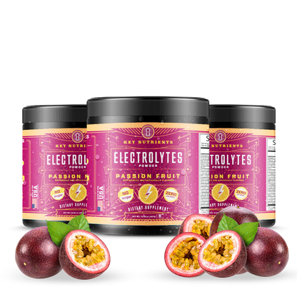 Three jars of Electrolyte Recovery Plus Powder (Sugar-Free) are displayed enticingly, complemented by fresh passion fruits in front. Perfect for a keto diet, this hydration drink ensures you stay refreshed and revitalized.