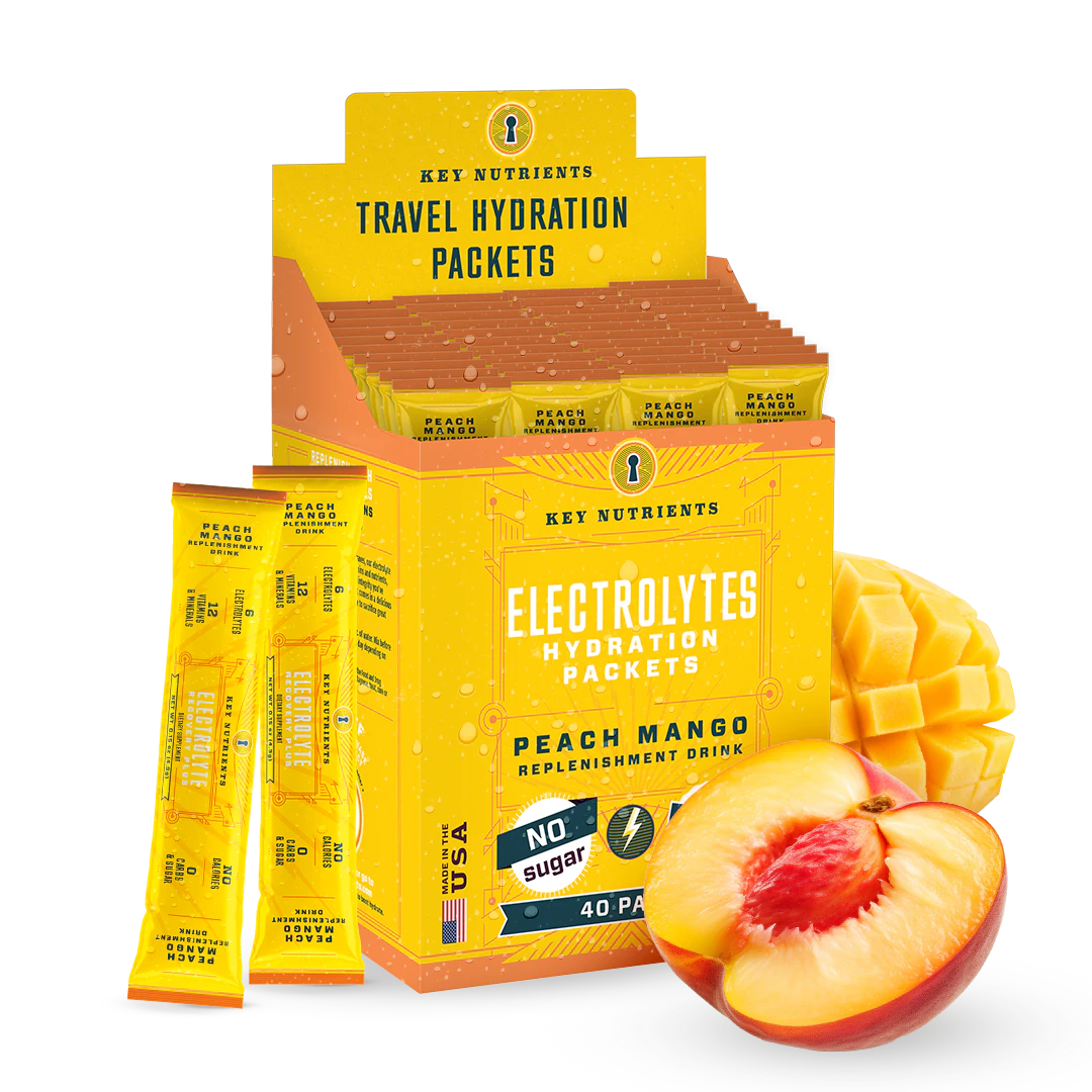 Electrolyte Recovery Plus Powder (Sugar-Free) in peach and mango flavor is ideal for a keto diet, complemented by the imagery of sliced peaches and mangoes. Enjoy this tasty hydration drink to keep refreshed and balanced all day long.