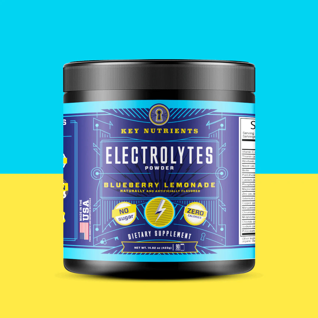 The Electrolyte Recovery Plus Powder (Sugar-Free) container in a refreshing blueberry lemonade flavor showcases its nutritional information, set against an eye-catching blue and yellow background. Ideal for hydration, this keto-friendly beverage keeps you refreshed and energized.